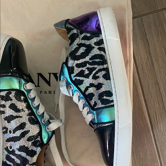 Black & Purple Women's Sneakers
made in Paris by Christian LOUBOUTIN
Red bottom - Picture 14 of 16